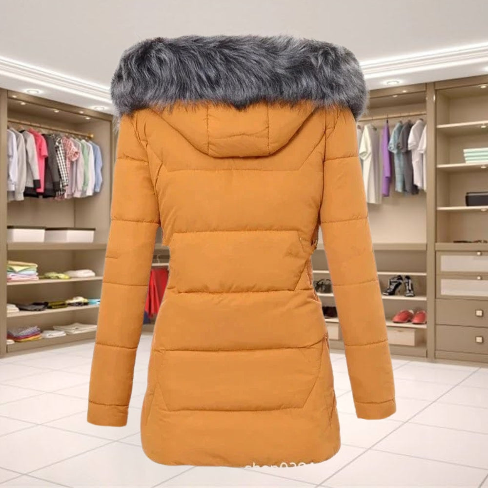  Casual women's coat with a fur collar, offering warmth and style for winter outings.