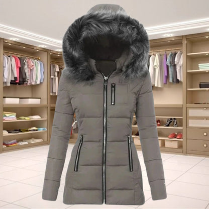  Casual women's coat with a fur collar, offering warmth and style for winter outings.