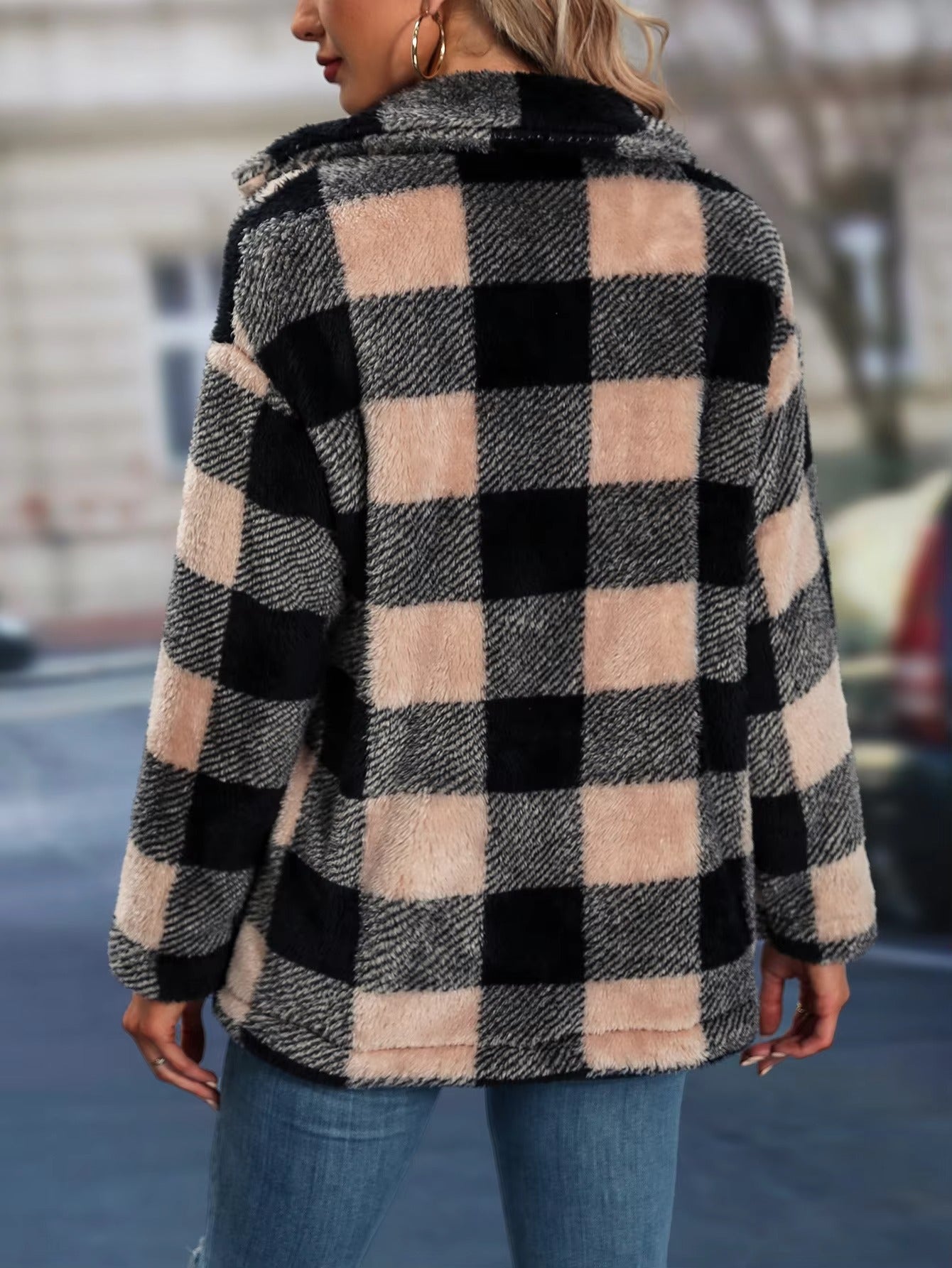 Women's winter plaid jacket, combining warmth and style for cold-weather fashion.