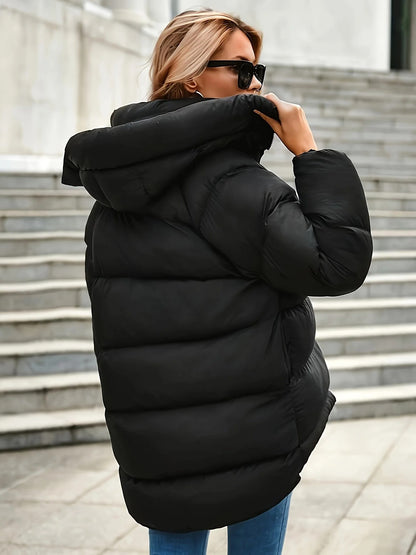  Elegant hooded winter coat for women, stylish and warm outerwear for winter weather.