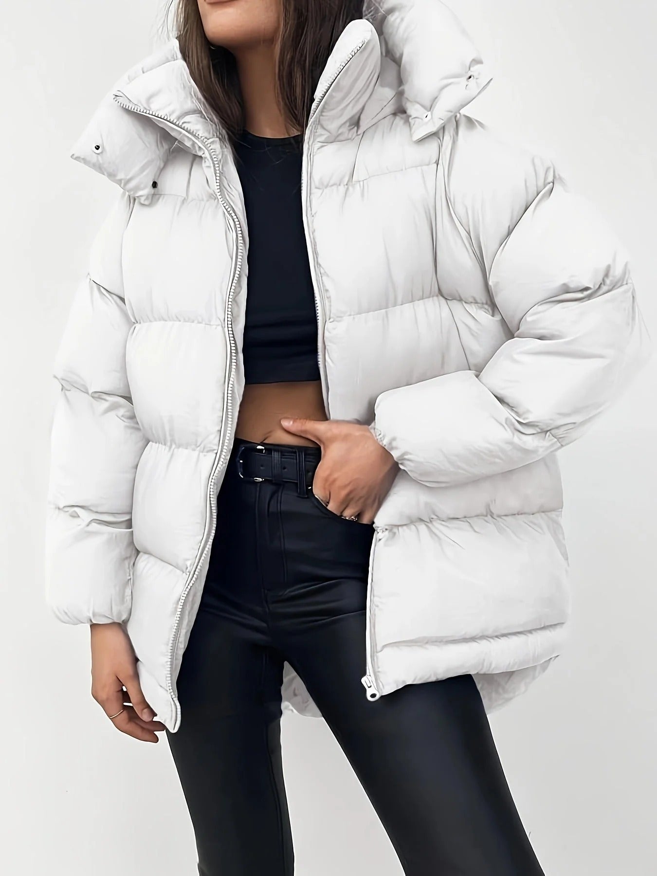  Elegant hooded winter coat for women, stylish and warm outerwear for winter weather.