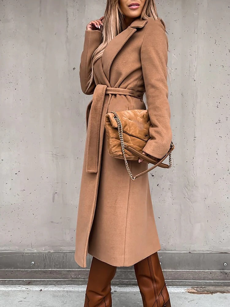 Elegant wool coat for women, offering warmth, style, and a flattering tailored fit for winter wear.