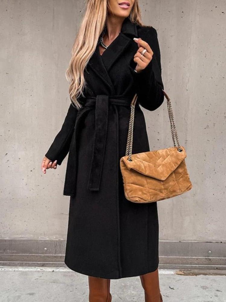 Elegant wool coat for women, offering warmth, style, and a flattering tailored fit for winter wear.