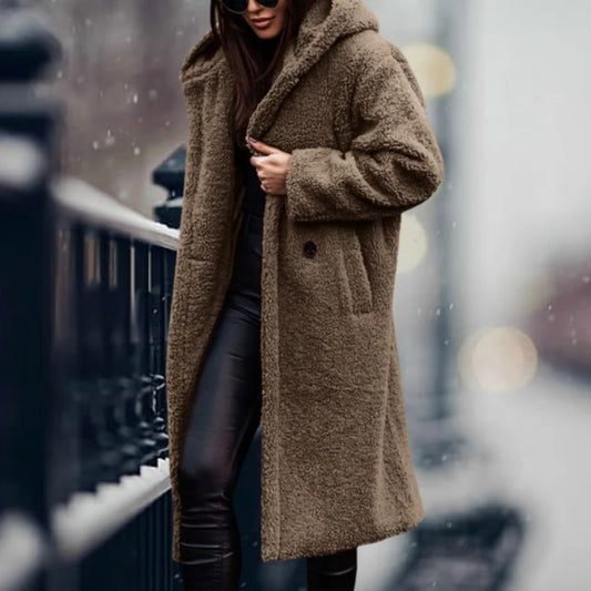 Women's fur hooded jacket, perfect for staying warm and stylish during cold weather.