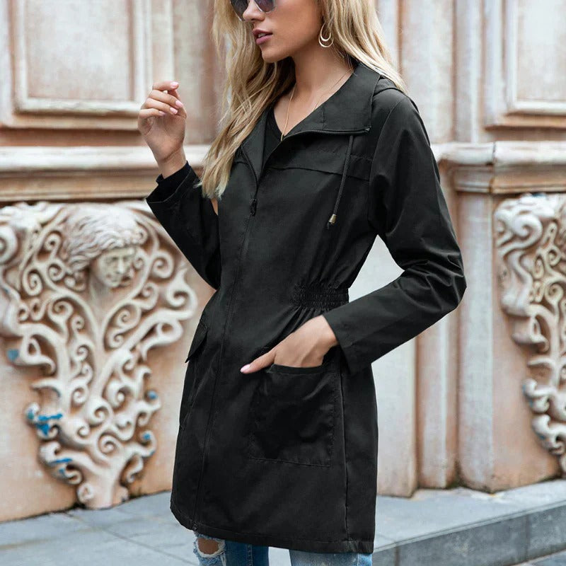 Lightweight long hooded raincoat offering full coverage and water protection for rainy days.