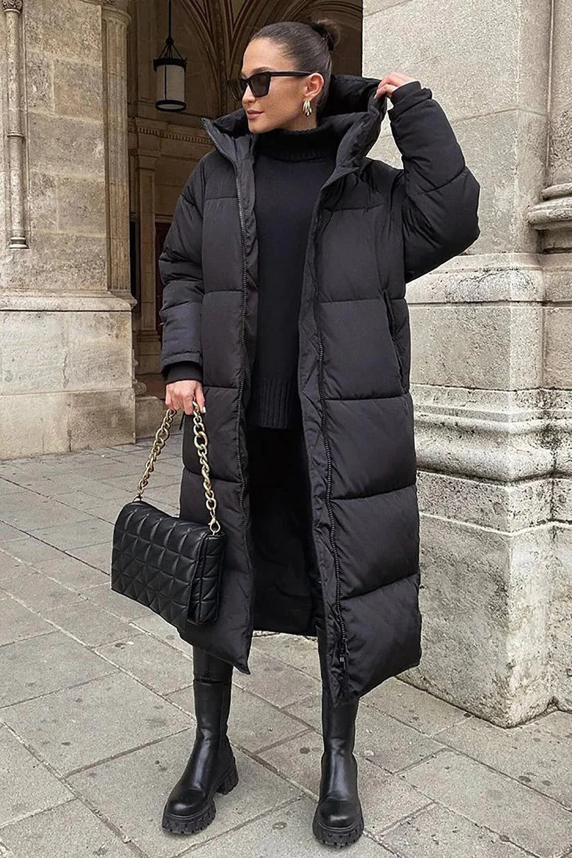 Long puffer winter coat, designed for warmth and style in cold weather.