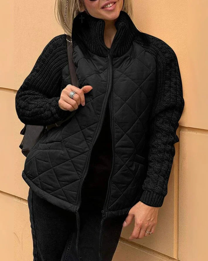 Luxurious padded jacket, providing warmth and style for winter with a sleek, flattering fit.