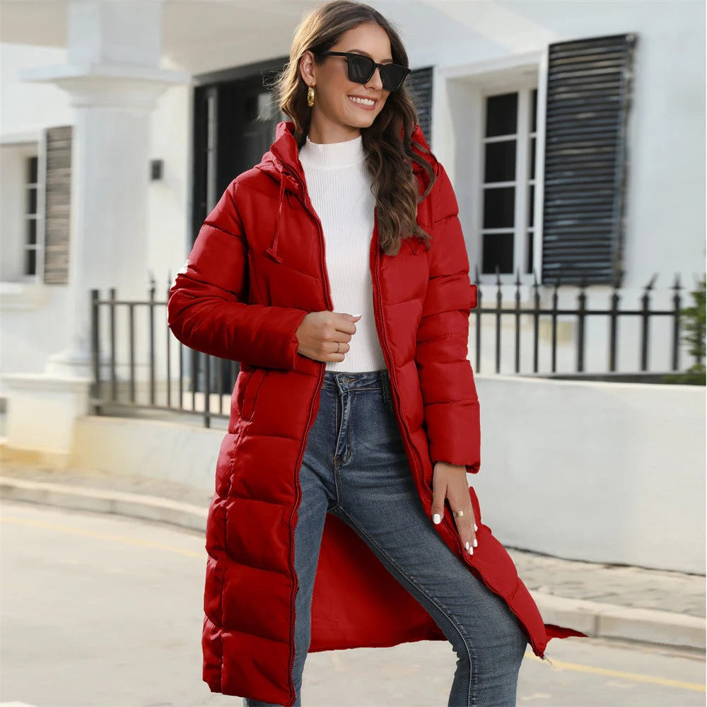 Quilted down jacket for women, offering warmth and style with a lightweight, flattering fit.