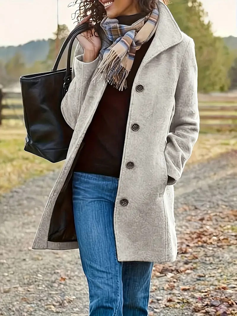 stylish autumn and winter coat, perfect for cold weather outings.